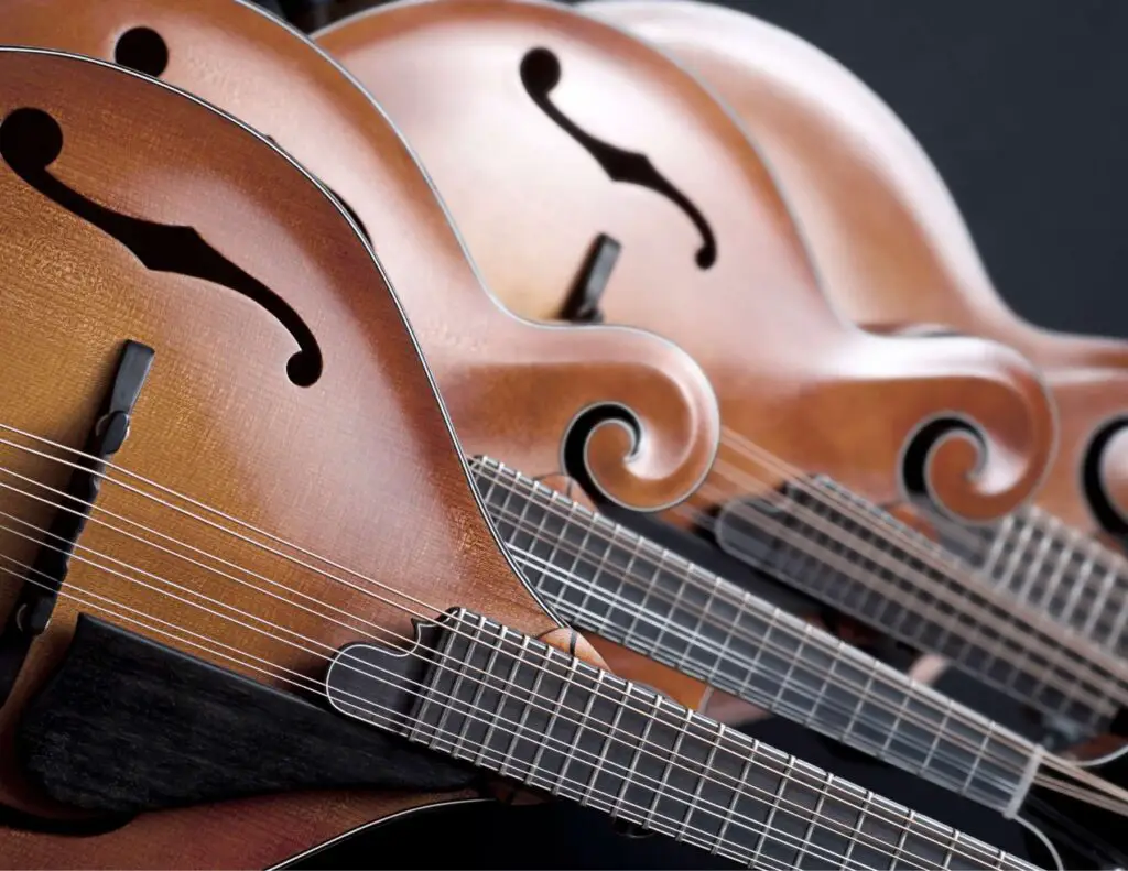 Mandolin with F holes and scroll top