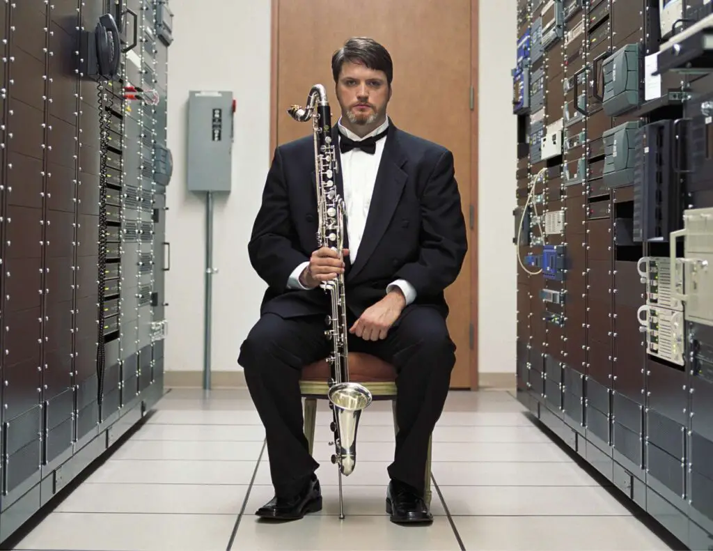 Man in Tux Holding a Bass Clarinet