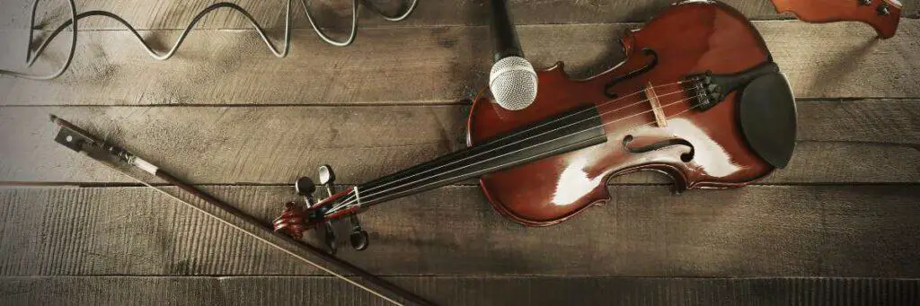 Discover the best techniques to mic a violin. Achieve crystal clear sound and ensure your violin's true tone shines through!